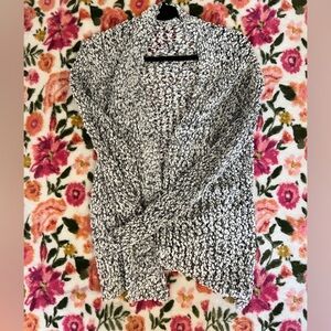 Fuzzy white and black sweater